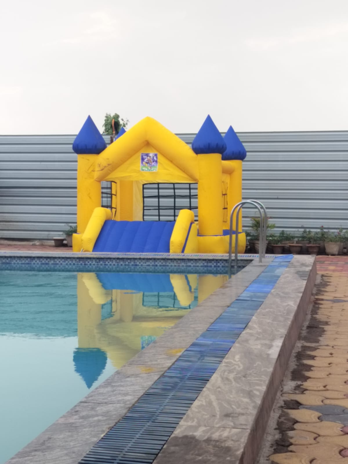 Swimming Pool with Kids Play Area