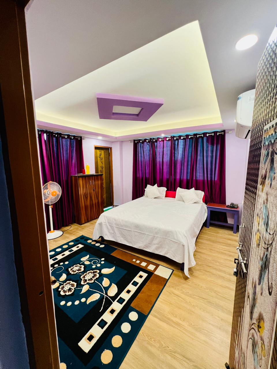 Premium Room with Purple Accents